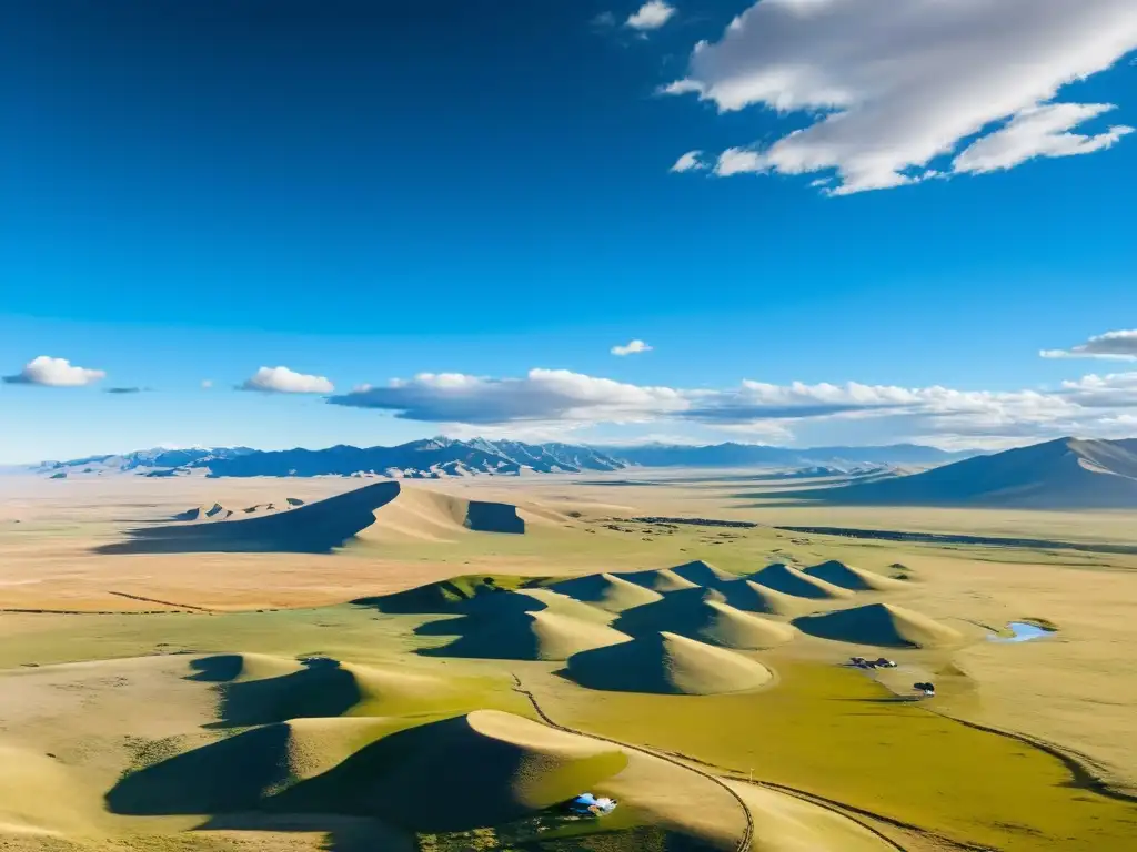 Vista aérea impresionante de la extensa estepa mongola con yurtas tradicionales y ganado pastando